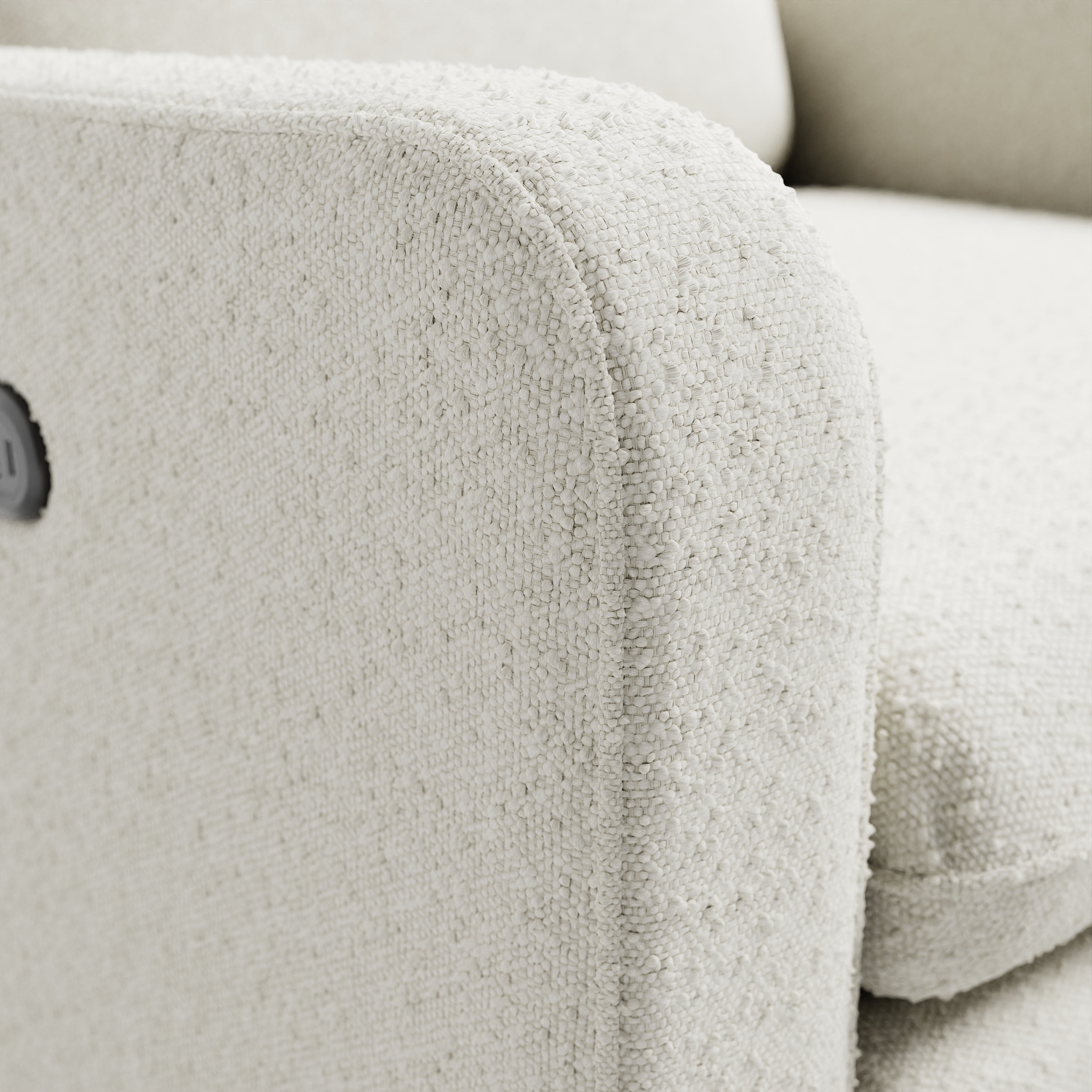 Teddi ivory boucle recliner close up of fabric on arm