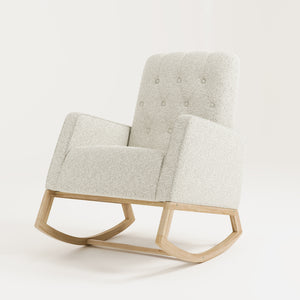 Angled view of natural wood base rocker chair with ivory boucle fabric