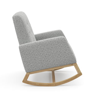 Side view of natural wood base rocker chair with salt & pepper boucle fabric