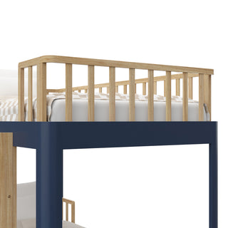 Close up view of natural wood  and blue bunk bed with bedding