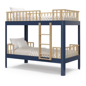 Angled view of natural wood  and blue bunk bed with bedding