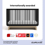 storkcraft black with driftwood crib with multiple award logos on bottom