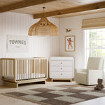 Santorini collection image of crib, 3 drawer chest with topper, and recliner in nursery