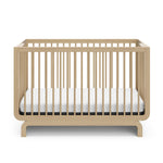 Storkcraft® Santorini® Deluxe 5-in-1 Convertible Crib with Bonus Toddler Guardrail.
