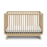 Storkcraft® Santorini® Deluxe 5-in-1 Convertible Crib with Bonus Toddler Guardrail.