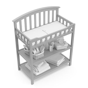 Bird’s-eye view of Pebble gray changing table with two open shelves