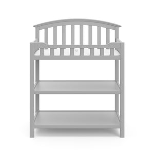 Front view of Pebble gray changing table with two open shelves