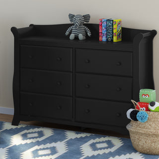 Black 6 drawer dresser in nursery