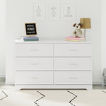 White 6 drawer dresser in nursery