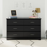Black 6 drawer dresser in nursery