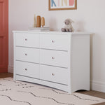 White 6 drawer dresser in nursery