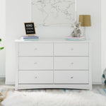 White 6 drawer dresser in nursery