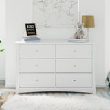 White 6 drawer dresser in nursery