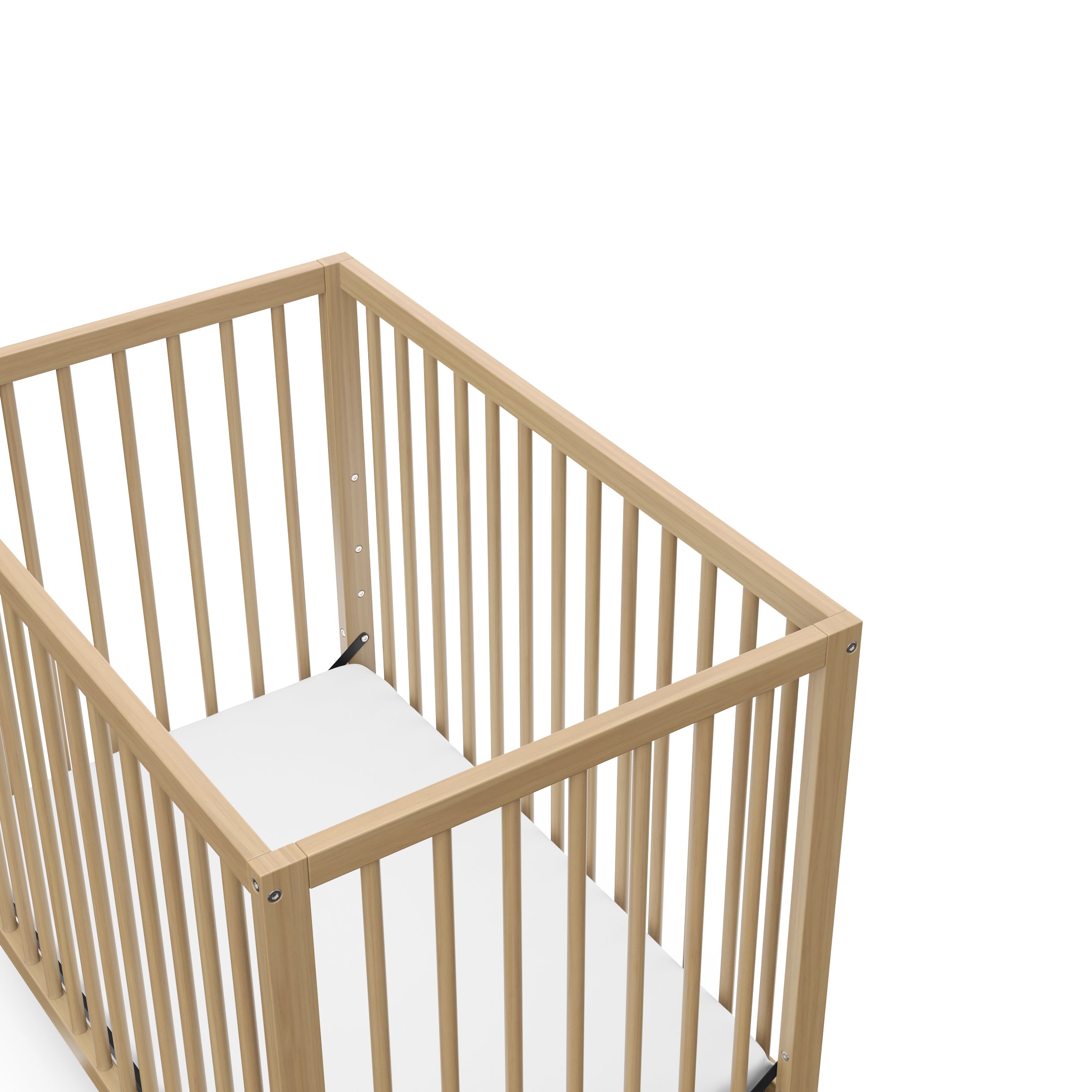 Graco® Teddi® 4-in-1 Convertible Mini Crib with Bonus Water-Resistant Mattress.