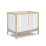 Graco® Teddi® 4-in-1 Convertible Mini Crib with Bonus Water-Resistant Mattress.