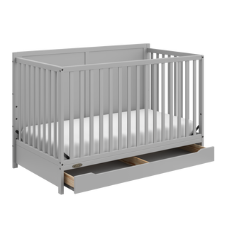 pebble gray crib with open drawer