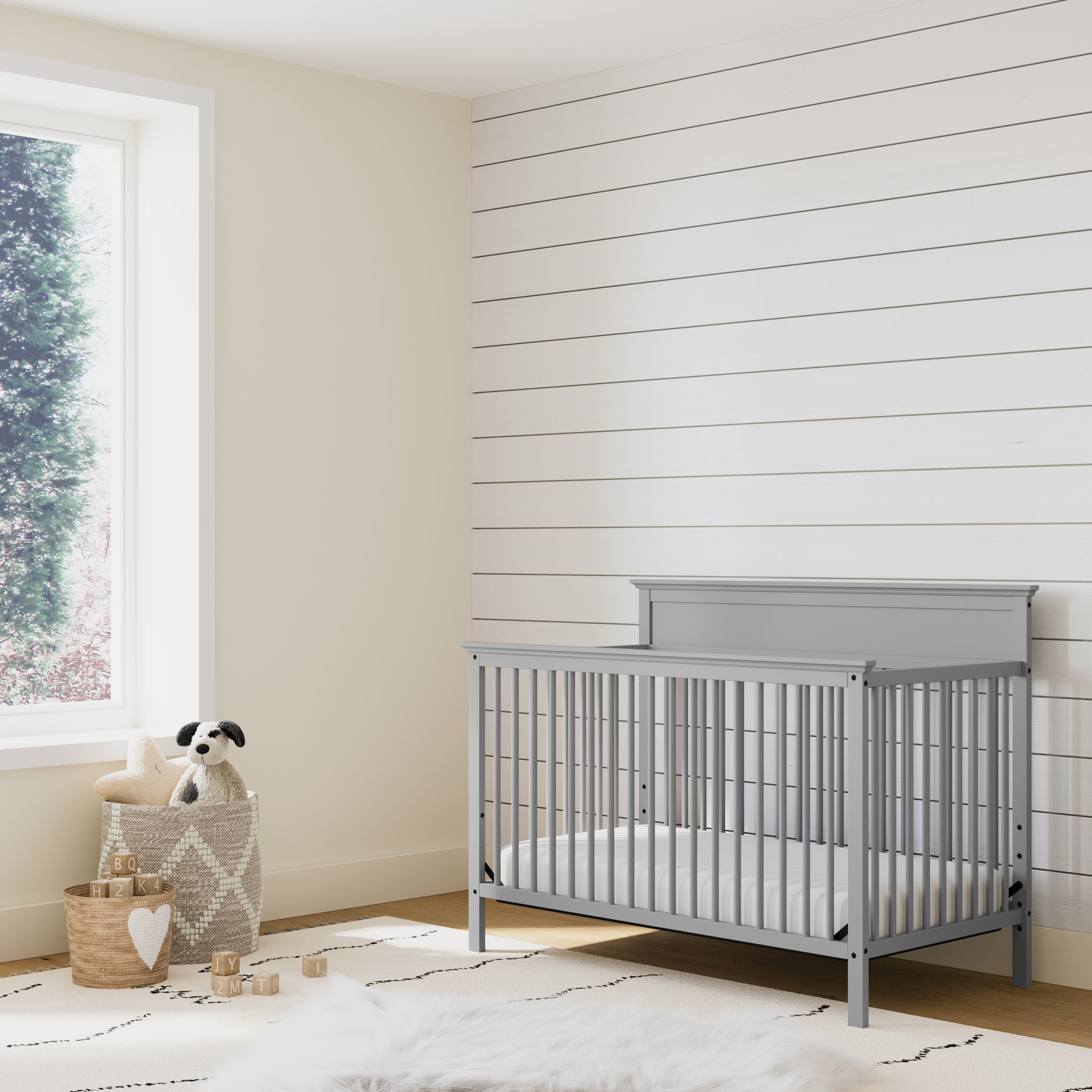 Pebble gray crib in nursery