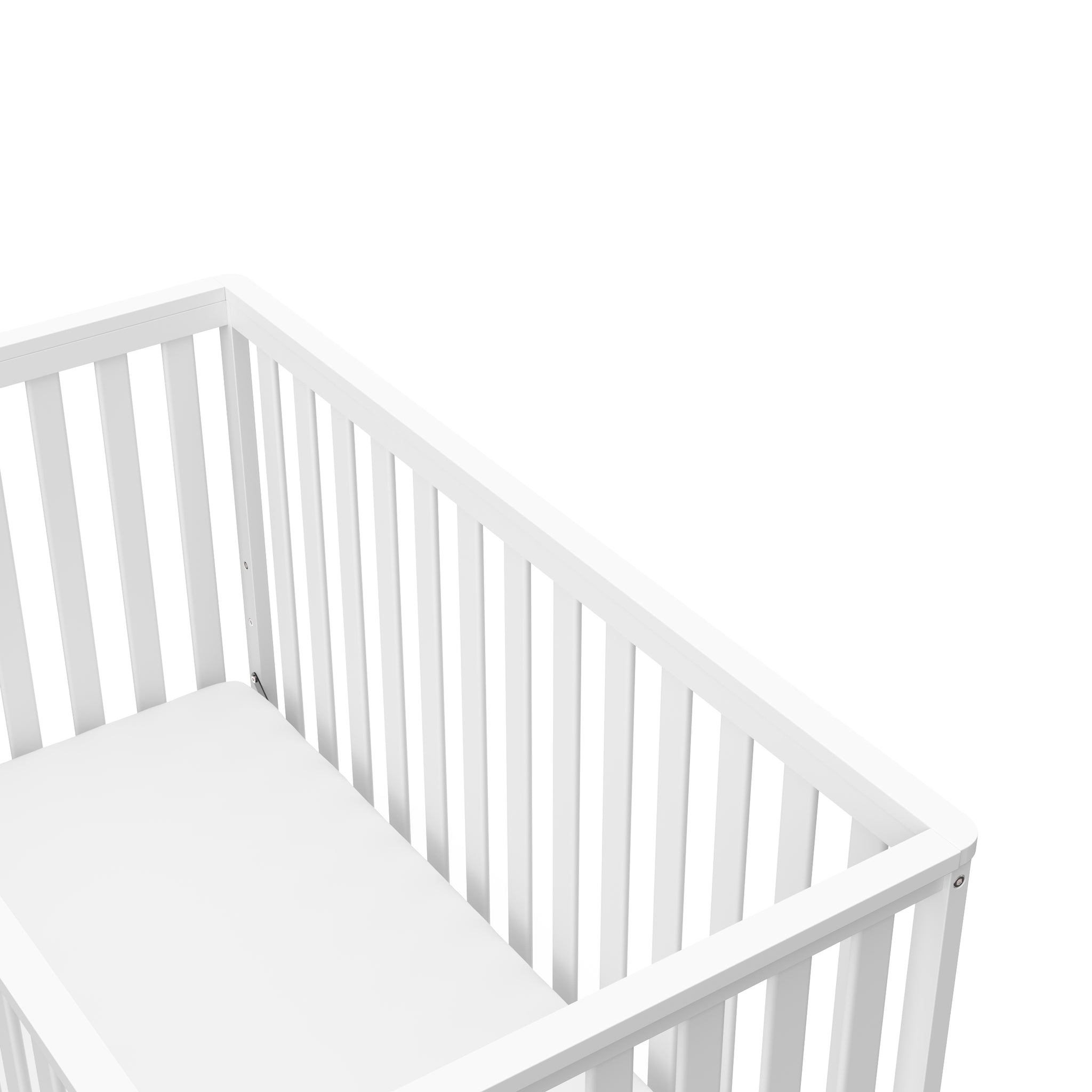 Close-up view of white with pebble gray crib's headboard 