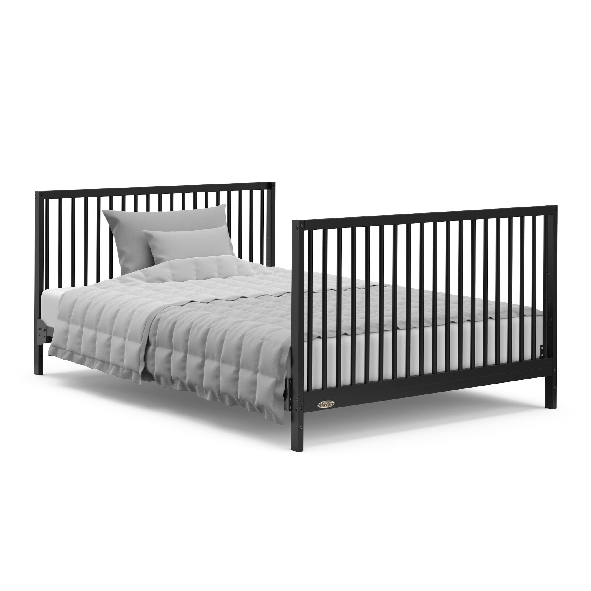 Black crib with drawer in full-size bed with headboard and footboard conversion
