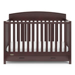 Front view of espresso crib with drawer