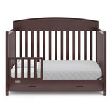 espresso crib with drawer in toddler bed conversion with one safety guardrail