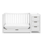 White crib and changer with drawer in toddler bed conversion