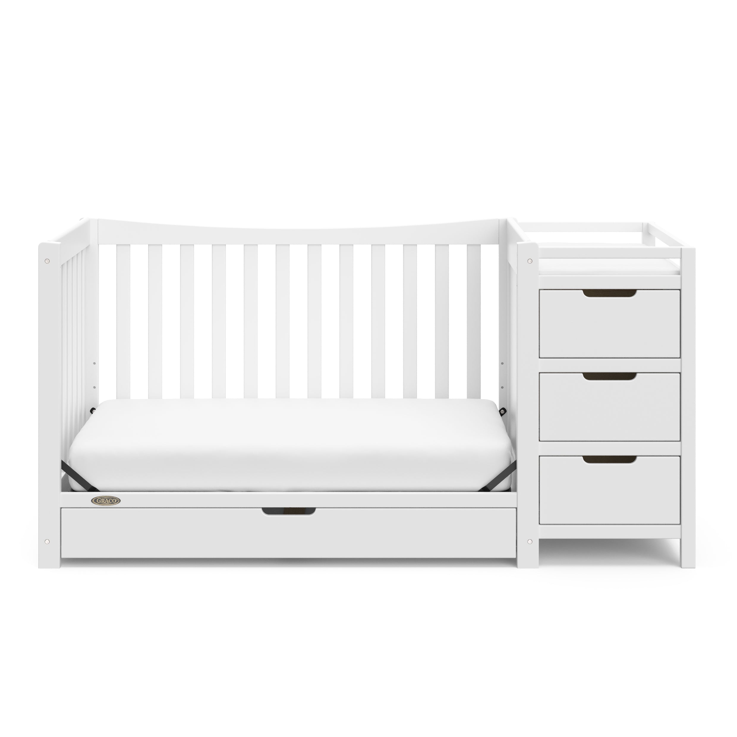 White crib and changer with drawer in toddler bed conversion