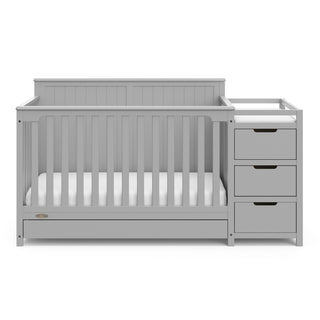 Front view of Pebble gray crib with drawer and changer with drawer