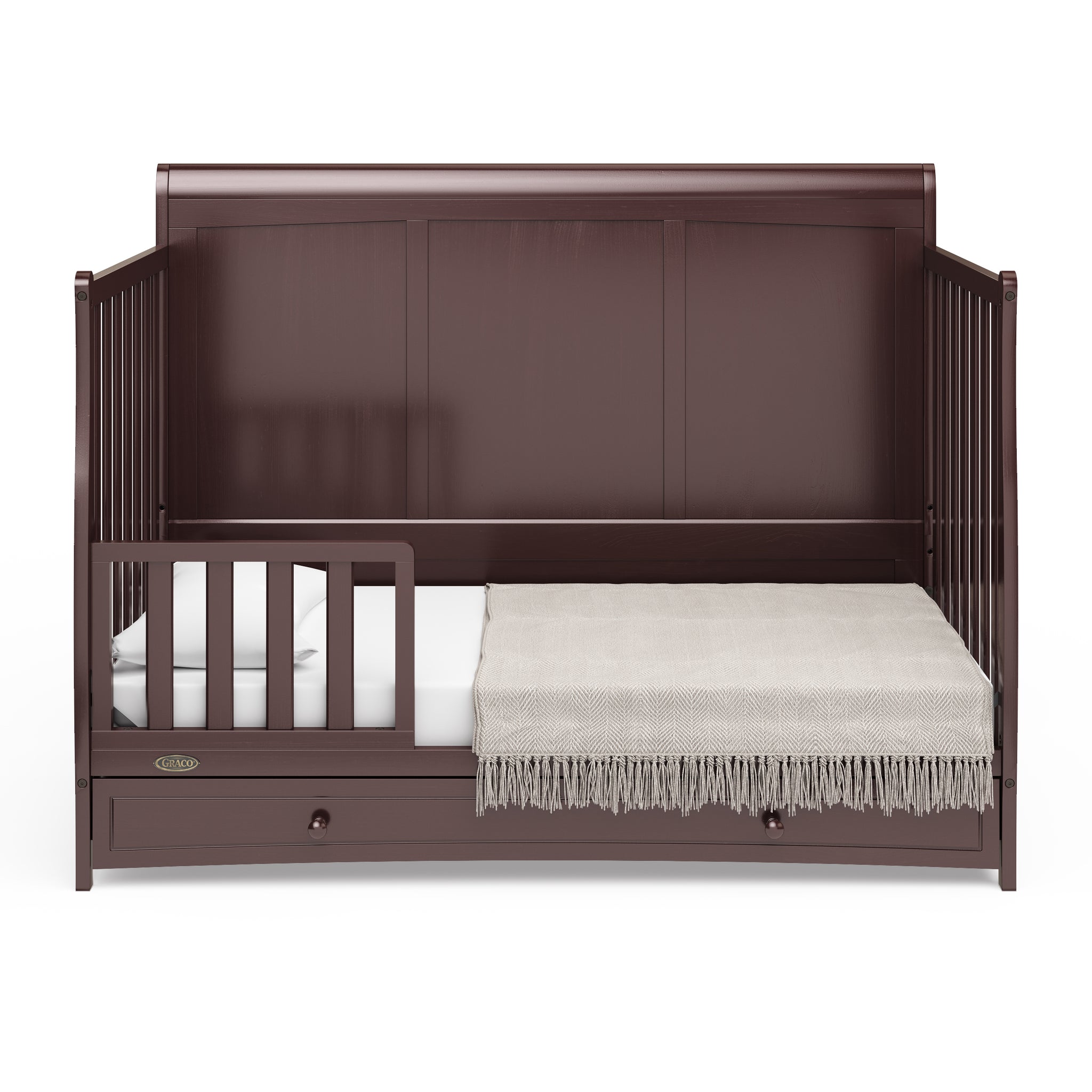 Espresso crib with drawer in toddler bed conversion with one safety guardrail