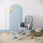 white glider and ottoman with light gray cushions in nursery