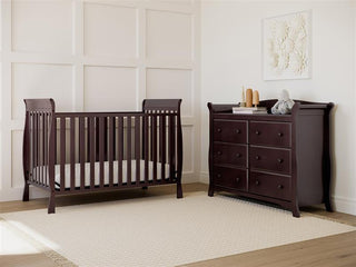 espresso crib in nursery with 6 drawer dresser
