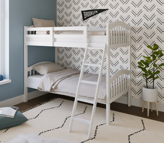 white bunk bed with fixed ladder angled in nursery