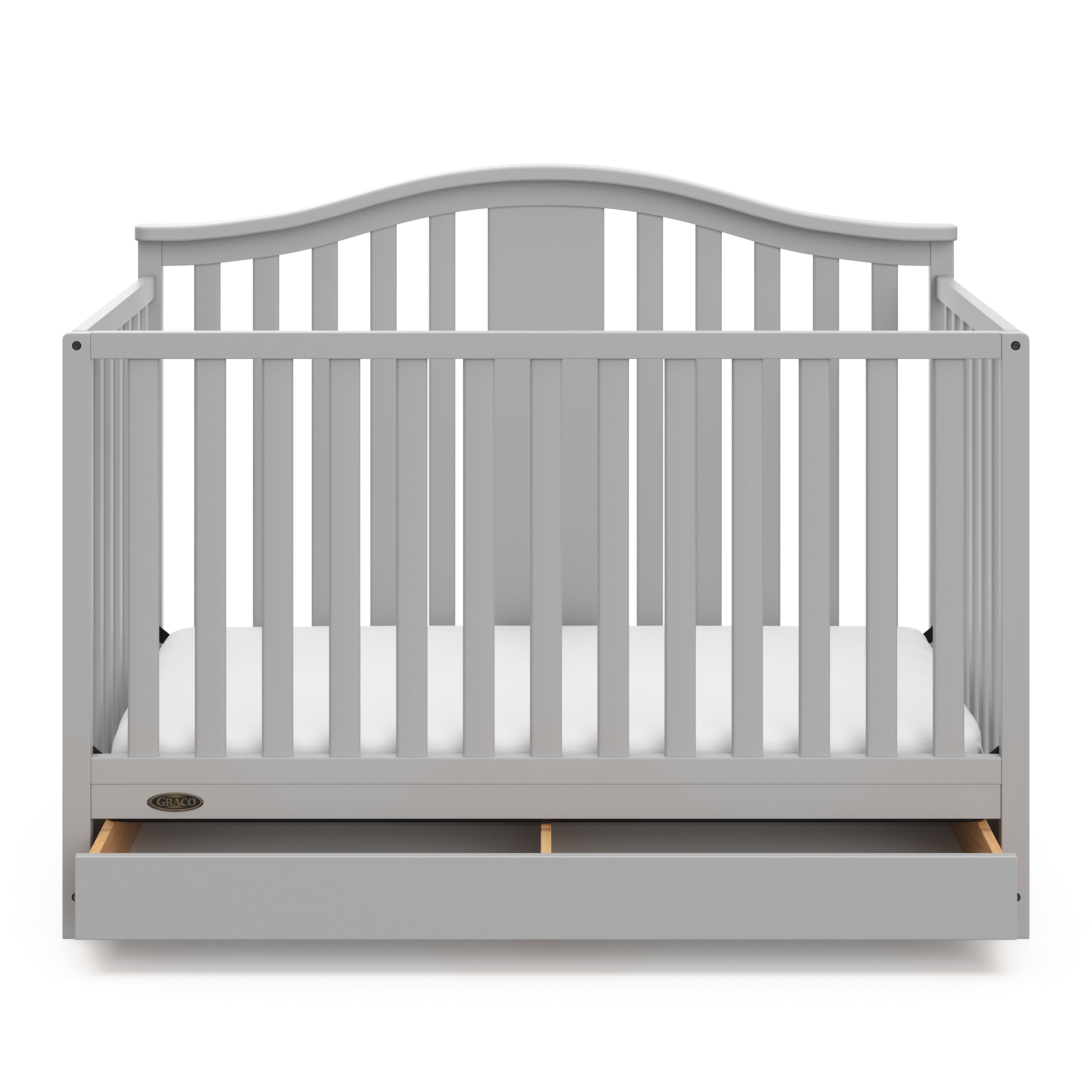 Pebble gray crib with open drawer angled