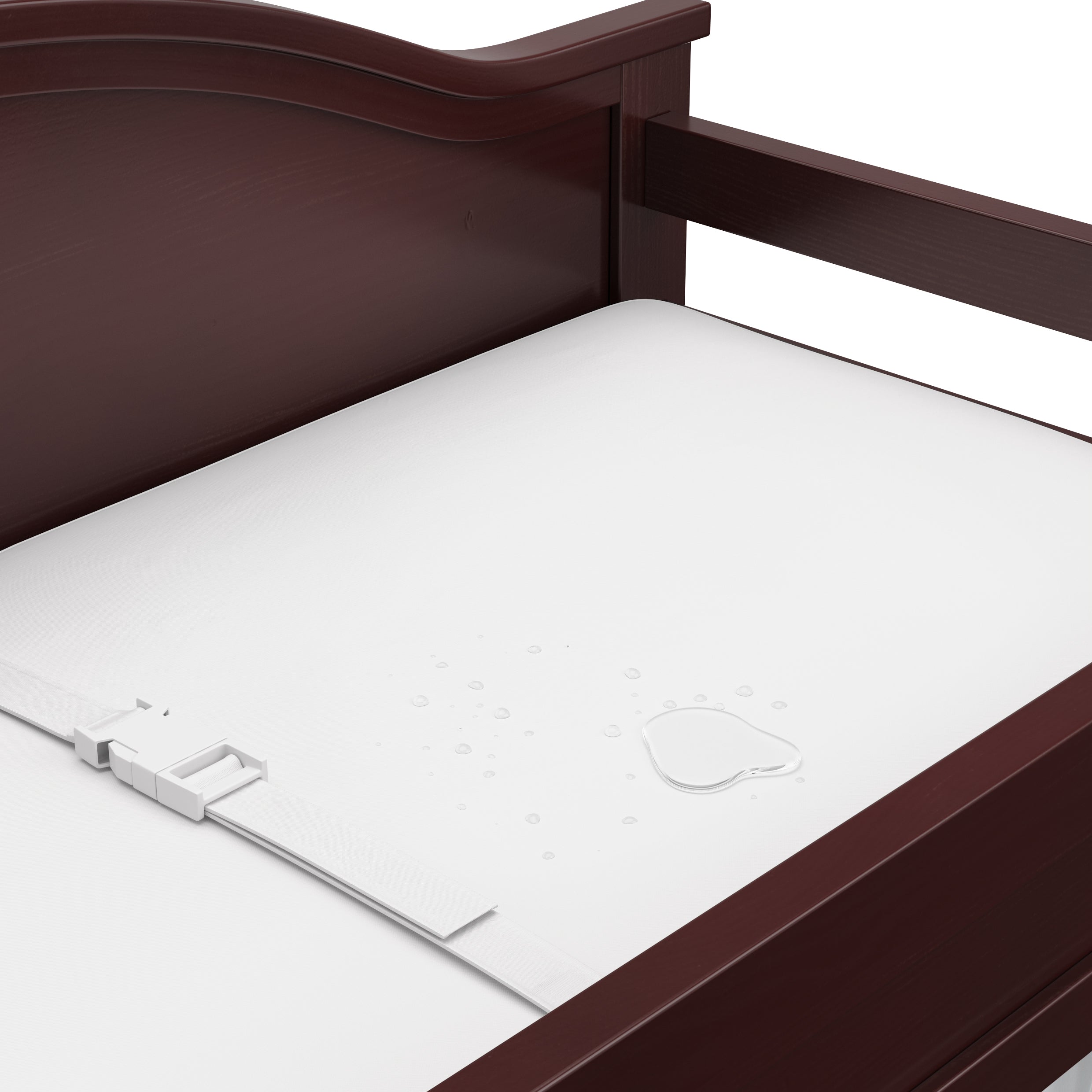 Story espresso changing table close up of changing pad and safety strap