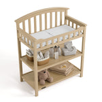 Graco driftwood changing table top view with baby items on shelves