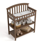 Graco hazelnut changing table top view with baby items on shelves