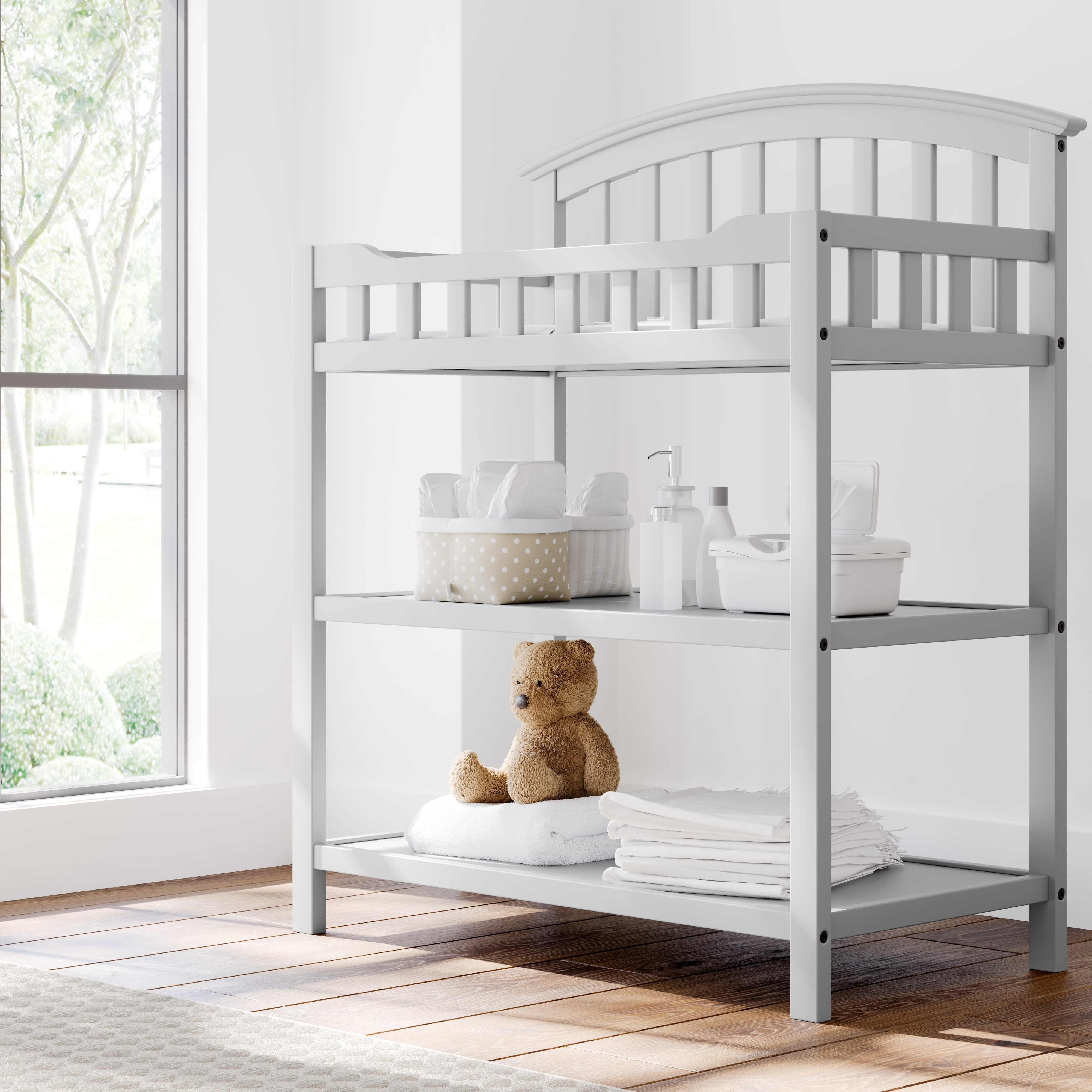 Graco pebble gray changing table in nursery