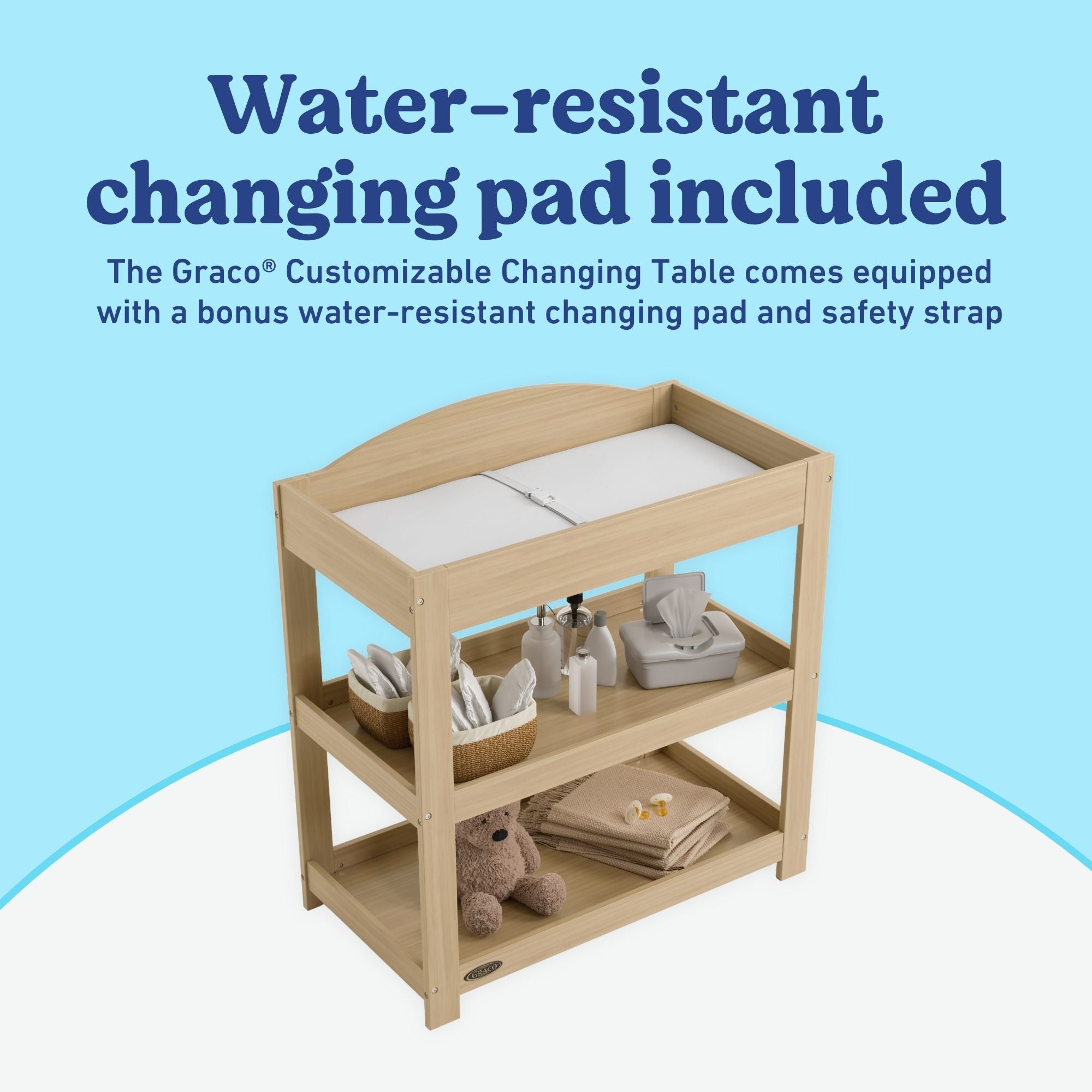 Graco driftwood customizable changing table changing pad callout