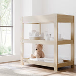 Customizable driftwood changing table in nursery