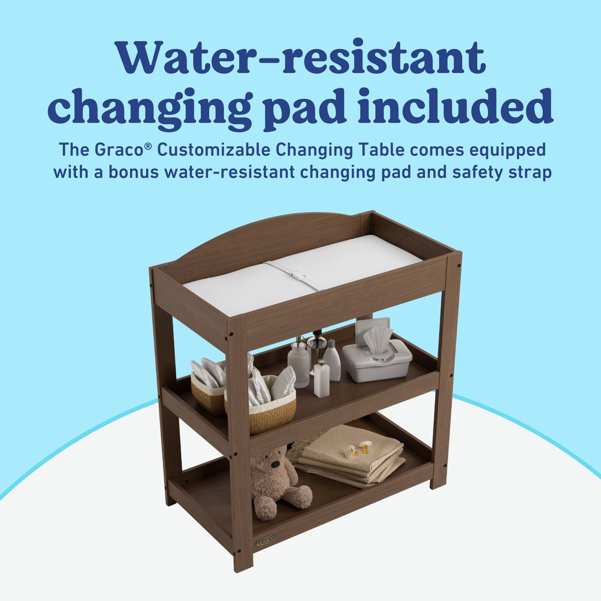 Graco hazelnut customizable changing table changing pad callout