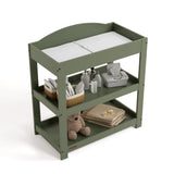 Customizable olive changing table with baby items on both shelves top view
