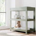 Customizable olive changing table in nursery