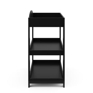 side view of black changing table with removable headboard and two open shelves