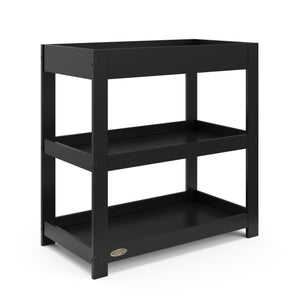 angled view of black changing table with two open shelves