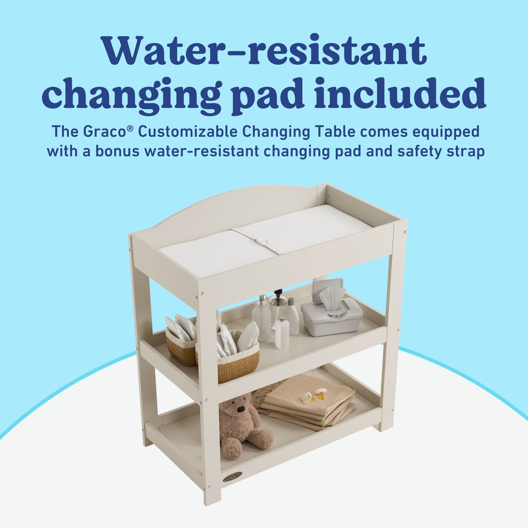 Graco frosted oat customizable changing table changing pad callout