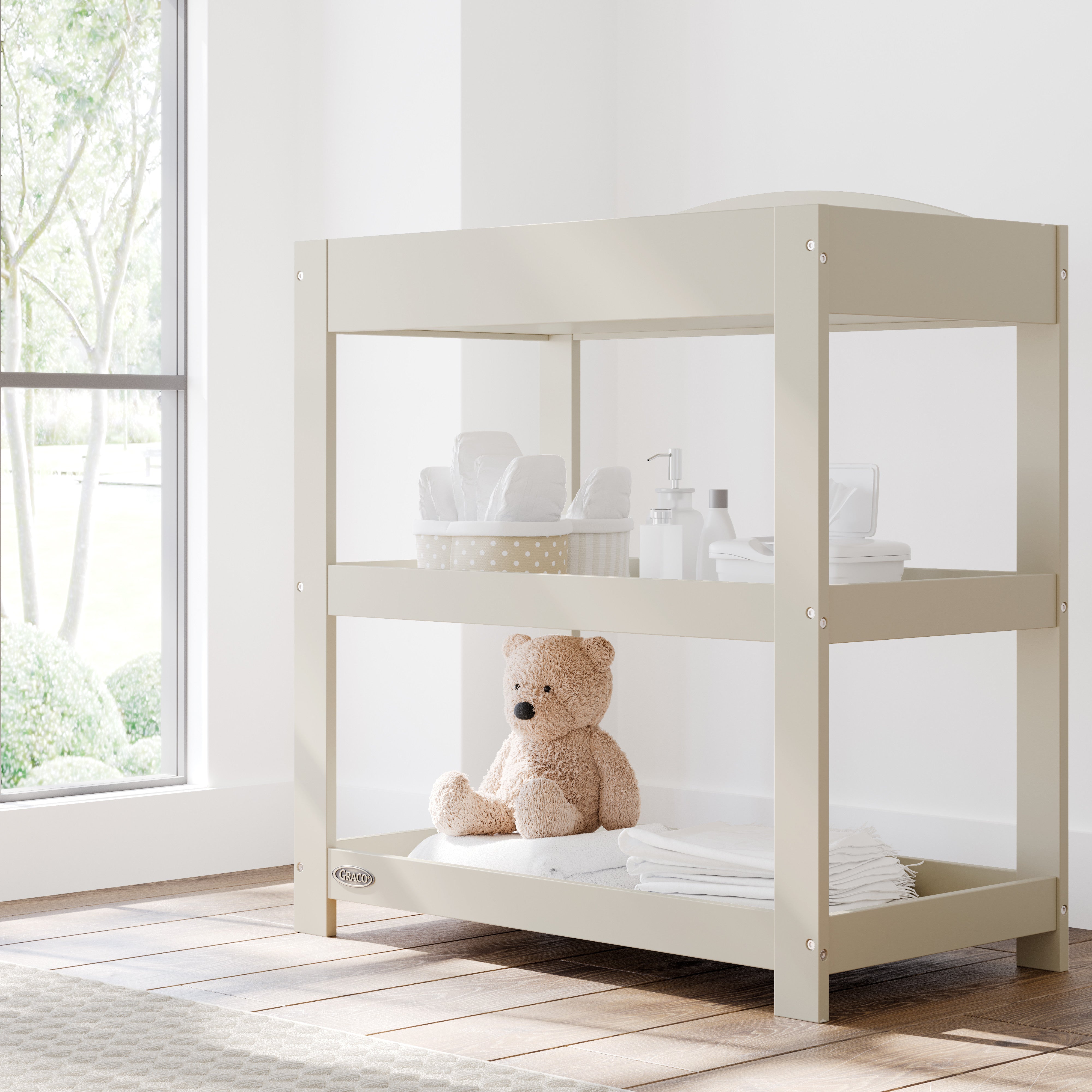 Customizable frosted oat changing table in nursery