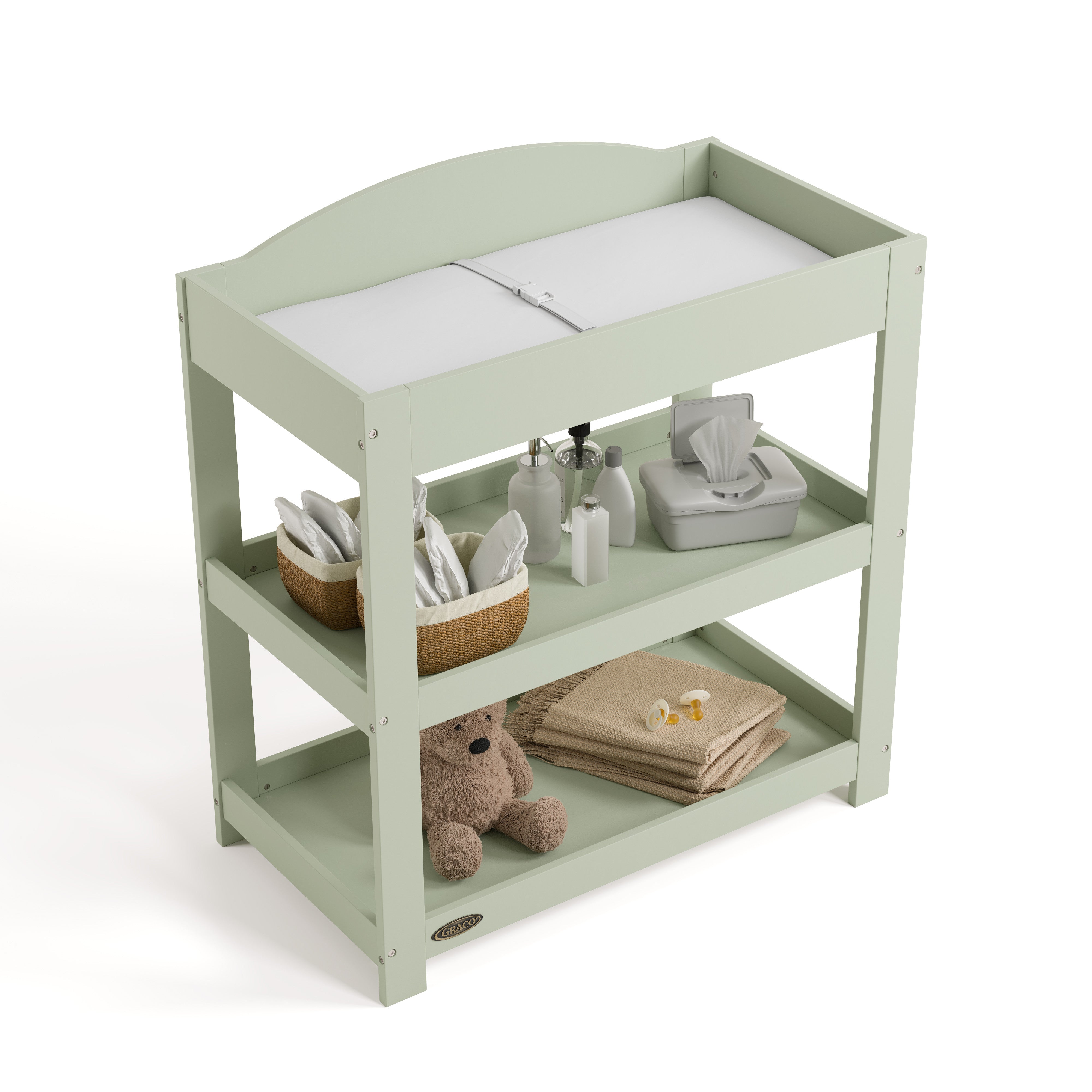 Customizable sage changing table with baby items on both shelves top view