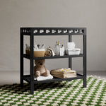 Morningside black changing table in a nursery