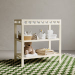 Morningside frosted oat changing table in a nursery