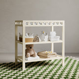 Morningside frosted oat changing table in a nursery